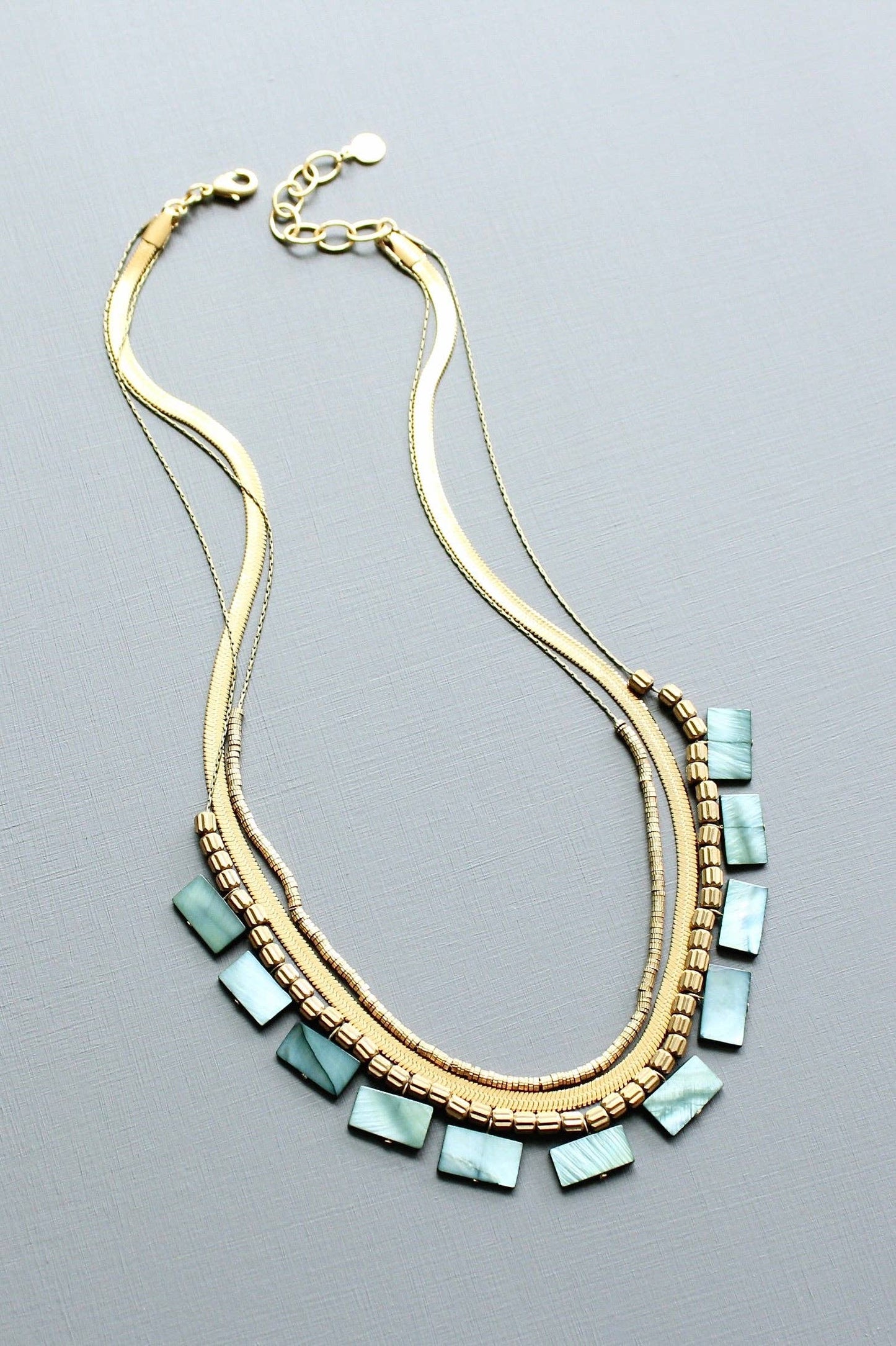 Green shell triple-strand necklace