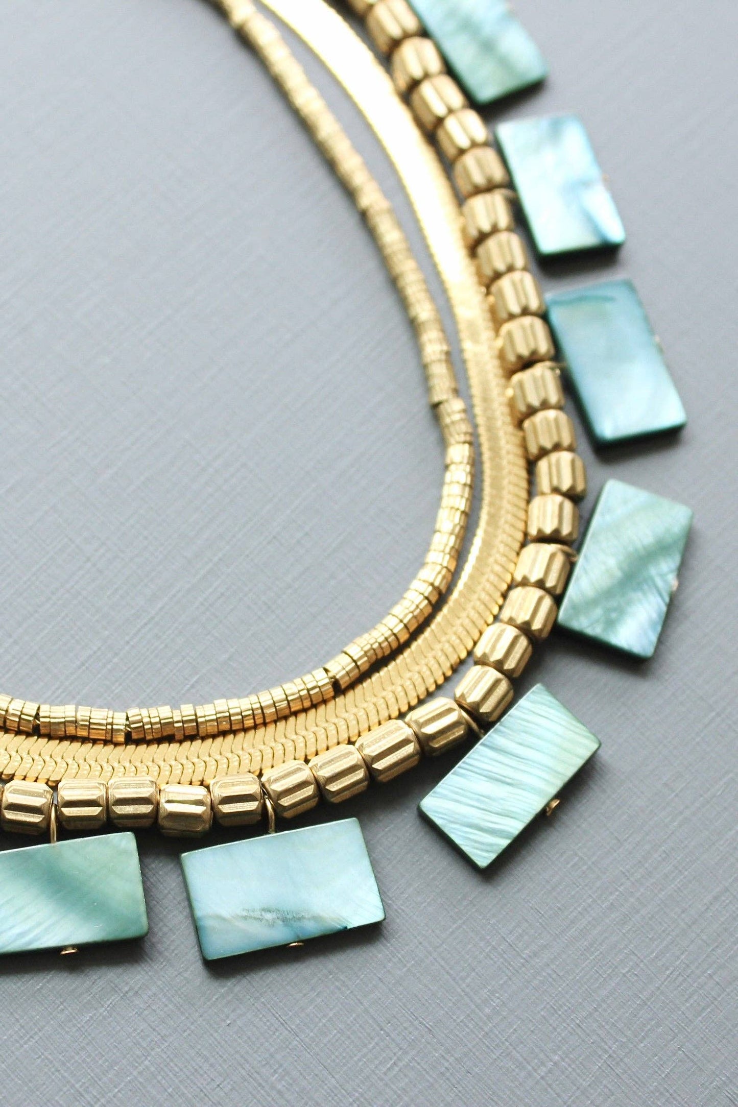 Green shell triple-strand necklace