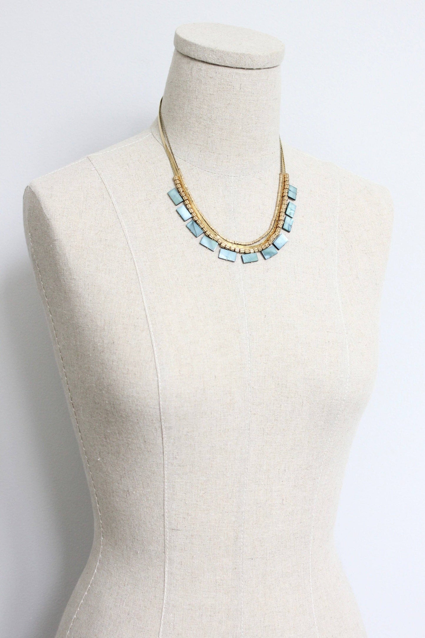 Green shell triple-strand necklace